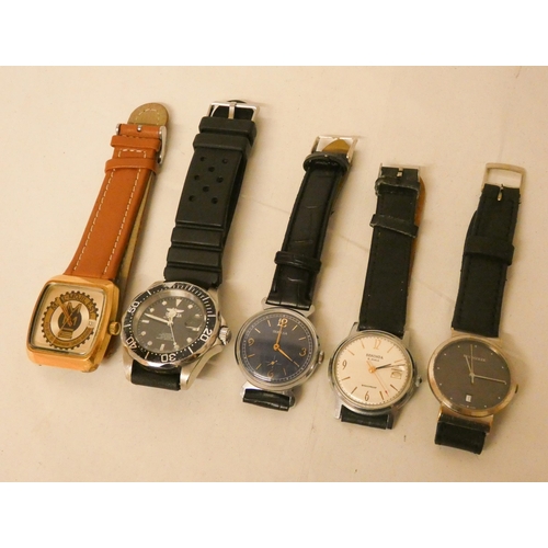 621 - A collection of five unusual vintage watches to include Bucherer, Invicta and a Russian example.