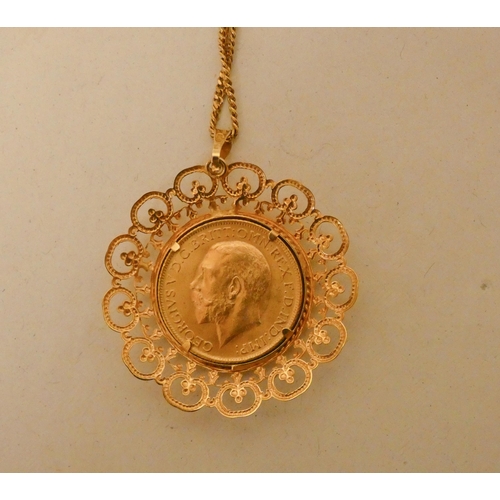 670 - A George V 1915 Full Gold Sovereign, mounted as a pendant on a 9ct gold chain. Gross weight 15.9gms.