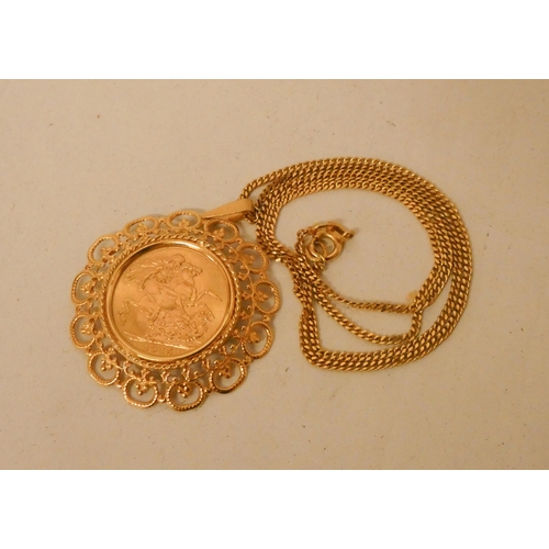 670 - A George V 1915 Full Gold Sovereign, mounted as a pendant on a 9ct gold chain. Gross weight 15.9gms.