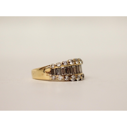 674 - A modern diamond half hoop band set with a central row of baguette cut diamonds, flanked with claw s... 