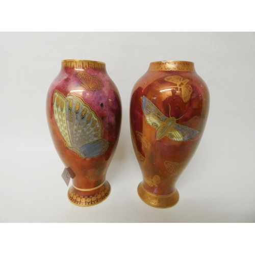 251 - Two Carlton ware Armand Lustre pair of vases decorated with butterflies, 22cms tall