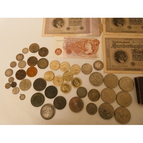 757 - A collection of coins and bank notes to include a bank of England 10 shilling note with the first fo... 