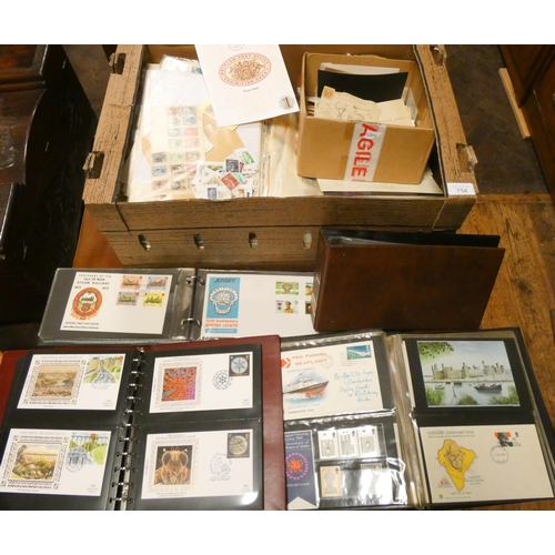 754 - A large box of English and Foreign loose stamps, together with three albums of First day covers in p... 