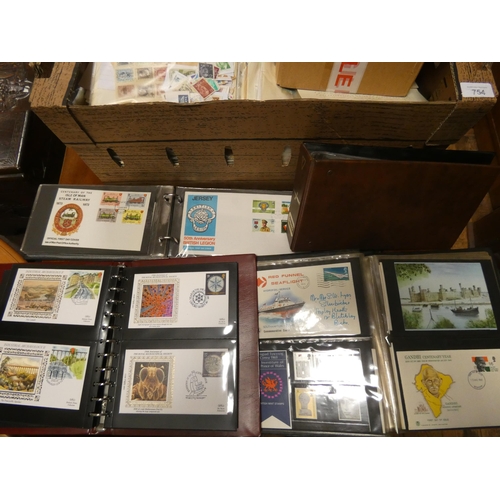 754 - A large box of English and Foreign loose stamps, together with three albums of First day covers in p... 