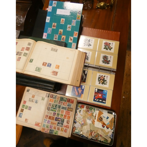 756 - A large collection of English and foreign stamps, tin of loose stamps, mostly within albums etc