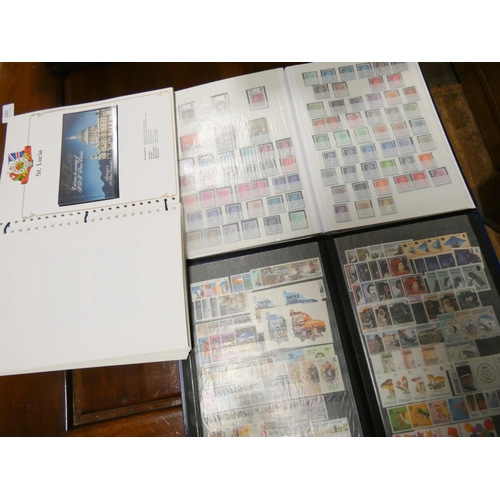 756 - A large collection of English and foreign stamps, tin of loose stamps, mostly within albums etc