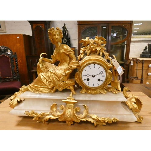 413 - A French striking mantel clock with gilt metal figure of Goddess Ceres mount on alabaster base. Over... 