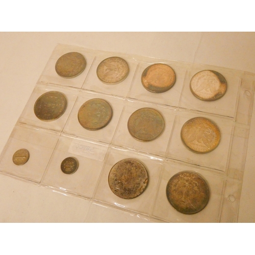 261 - A collection of ten US dollar coins and two others