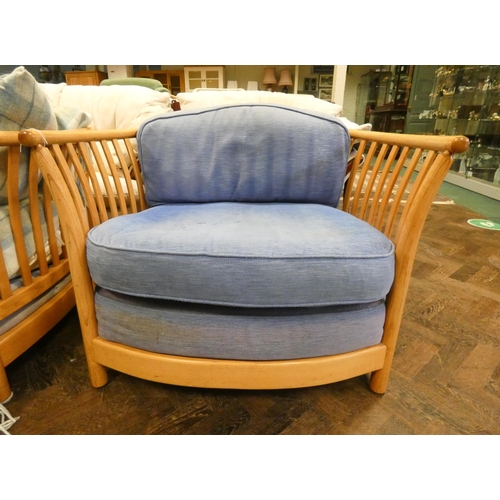 143 - A pair of Ercol Blonde Elm renaissance armchairs with blue upholstery