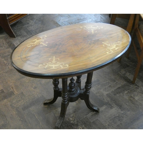 60 - A Victorian oval inlaid walnut centre table on quadruple style base, 3' wide