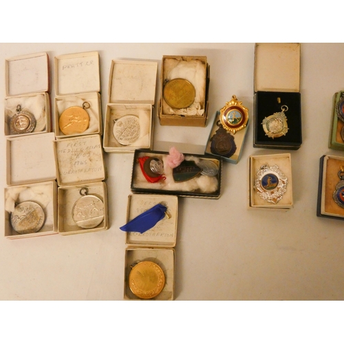 278 - A large collection of sporting medallions and medals, to include ten silver examples