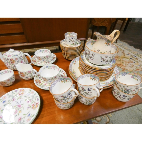 276 - A Minton Haddon Hall early morning breakfast set and a Minton floral residue of an extensive tea ser... 