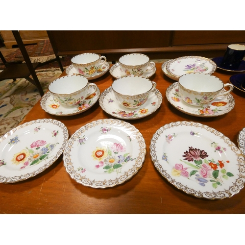 277 - A collection of Dresden cups and saucers, floral painted side plates and coalport coffee cans