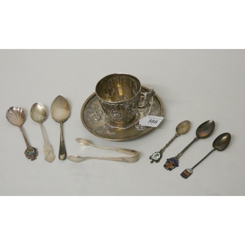 586 - A collection of silver teaspoons, nips and a Chinese white metal tea cup and saucer, gross weight 7 ... 