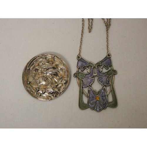 587 - A hallmarked silver and enamel Art Nouveau pendant and circular brooch