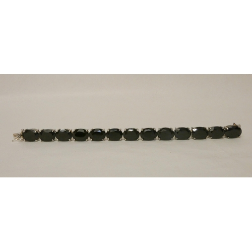 589 - A modern silver and black stone panel bracelet, 21 cms long