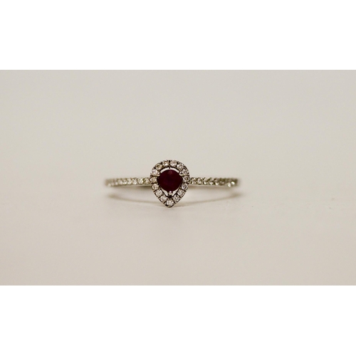 666 - A ruby and diamond modern pear shaped cluster ring, on 18ct white gold band. Ring size N. weight 1.8... 