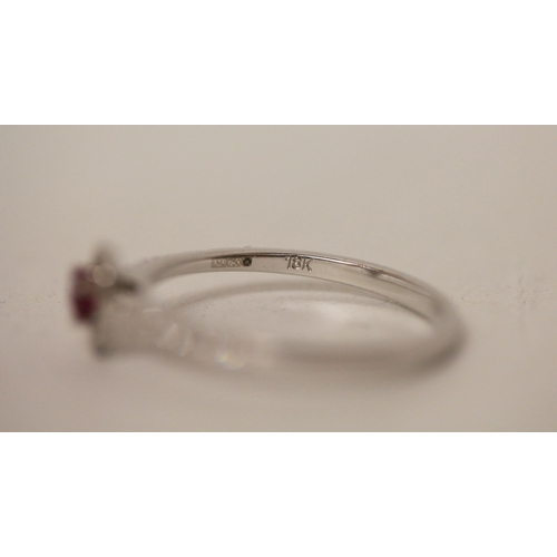 666 - A ruby and diamond modern pear shaped cluster ring, on 18ct white gold band. Ring size N. weight 1.8... 