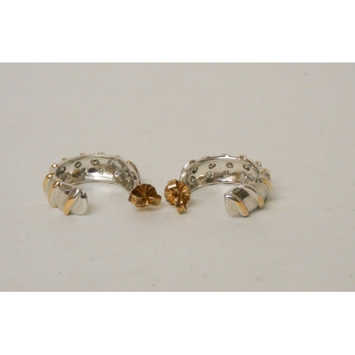 667 - A pair of vintage bespoke made diamond set bi-colour gold hoop earrings, each set with twelve brilli... 