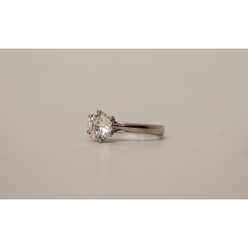 683 - A solitaire diamond ring, with a brilliant cut circular diamond weighing one carat in claw setting t... 