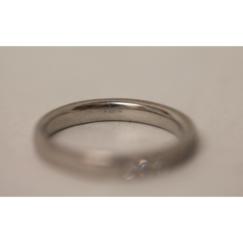 684 - A diamond half hoop eternity ring, in platinum. Unmarked. Gross weight 4g, ring size L