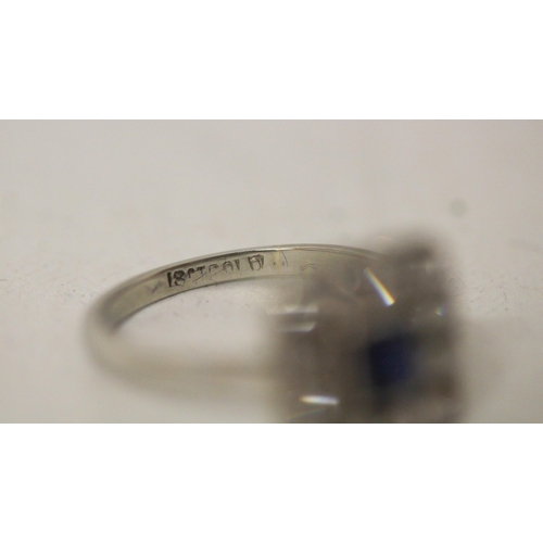 690 - An Art Deco sapphire and diamond square cluster ring, on 18ct white gold band. Ring size K, gross we... 