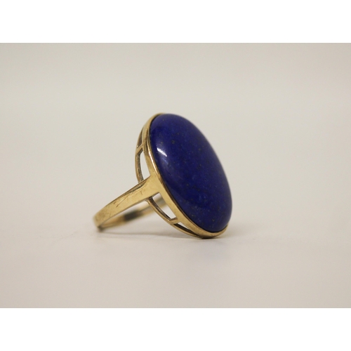 710 - A large lapis panel dress ring, on hallmarked 9ct yellow gold band, ring size S, gross weight 7.4g