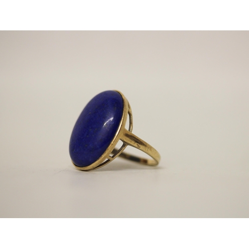 710 - A large lapis panel dress ring, on hallmarked 9ct yellow gold band, ring size S, gross weight 7.4g