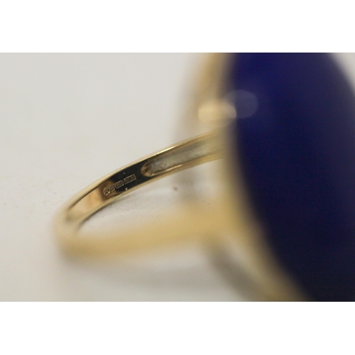 710 - A large lapis panel dress ring, on hallmarked 9ct yellow gold band, ring size S, gross weight 7.4g