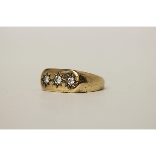 727 - A gents three stone diamond ring on 9ct yellow gold band, hallmarked, ring size S, gross weight 5.7 ... 