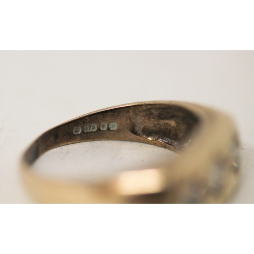 727 - A gents three stone diamond ring on 9ct yellow gold band, hallmarked, ring size S, gross weight 5.7 ... 