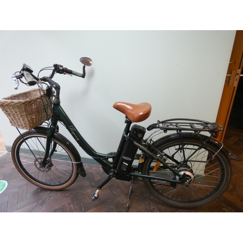 781 - A Regency green vintage style electric bicycle, with rear rack, front basket, mud guards and other v... 