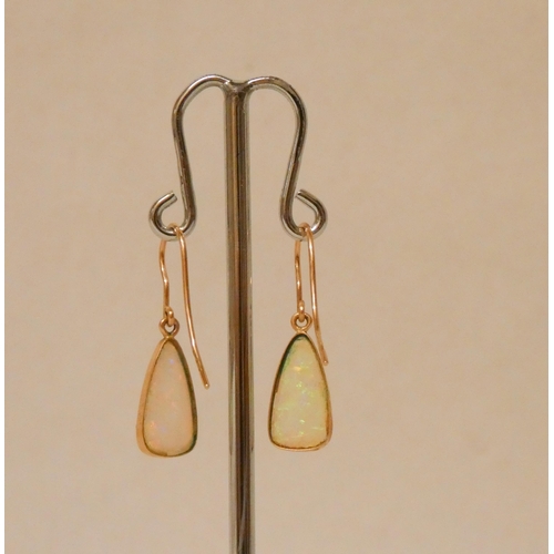 649 - A pair of Australian boulder opal drop earrings, rose gold wires, hallmarked indistinctly