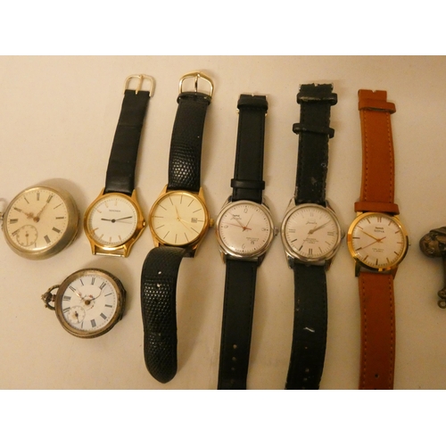 117 - A collection of five gents wrist watches, a silver fob watch, pocket watch and a vesta case