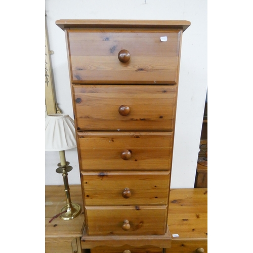 13 - A Victorian style pine chest of three long and two short drawers with bun handles and a matching sma... 