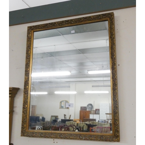 16 - A decorative gilt framed wall mirror