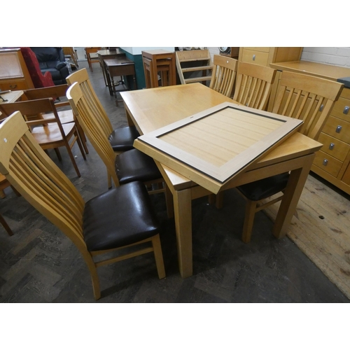 180 - A chunky light-oak extending dining table with centre leaf and six matching high slat back dining ch... 