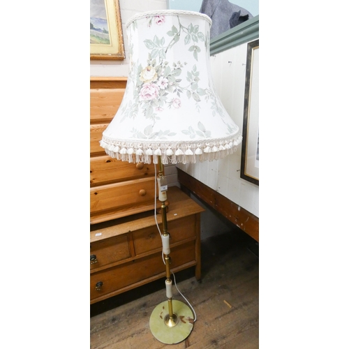 36 - A brass and green onyx standard lamp with floral shade