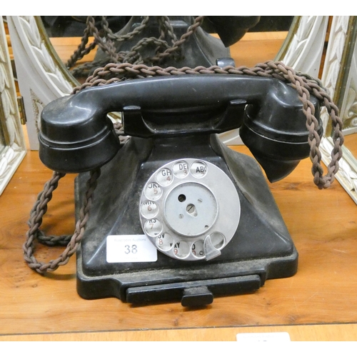 38 - A old black bakelite telephone