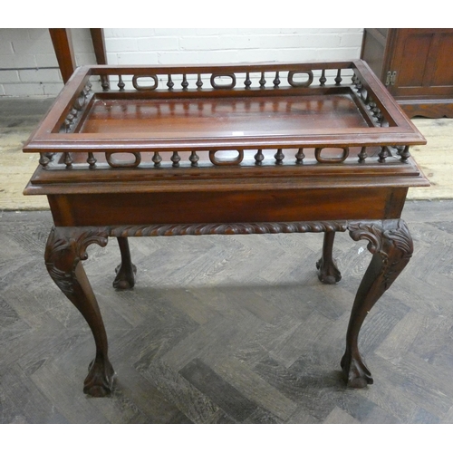 48 - A mahogany Georgian style silver table with pieced spindle gallery standing on cabriole legs with cl... 