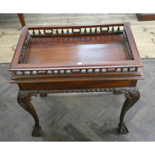 48 - A mahogany Georgian style silver table with pieced spindle gallery standing on cabriole legs with cl... 