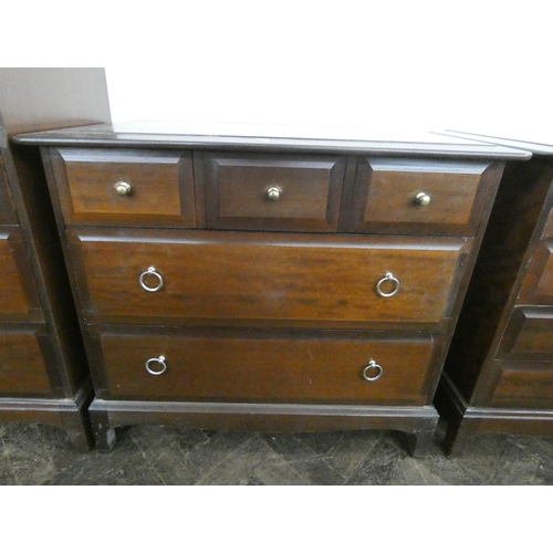 6 - A low Stag Minstrel mahogany chest of two long and three small drawers. 32