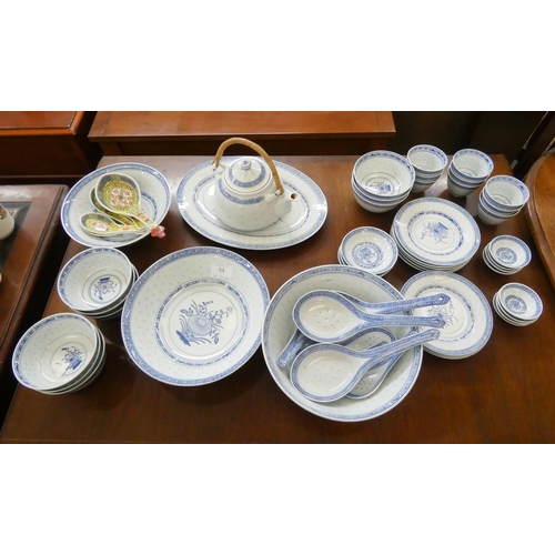 64 - A Chinese blue and white tea and rice bowl  set with spoons etc