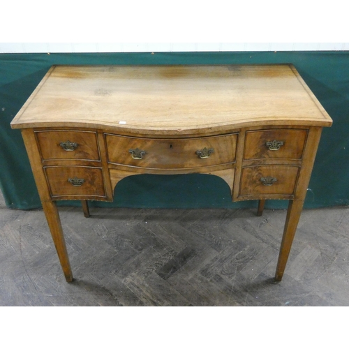 94 - An inlaid mahogany serpentine front knee-hole writing desk fitted five drawers standing on square ta... 