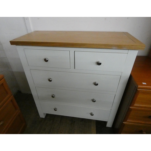 273 - A white painted chest of three long and two short drawers with light oak top. 2'9