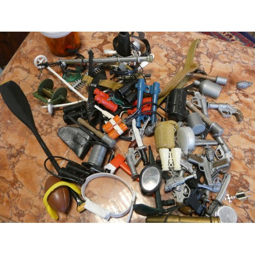 538 - A large quantity of vintage Action Man outfits, toys, kayak, boat all contained within two plastic c... 