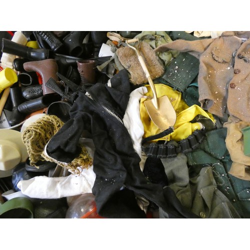 538 - A large quantity of vintage Action Man outfits, toys, kayak, boat all contained within two plastic c... 