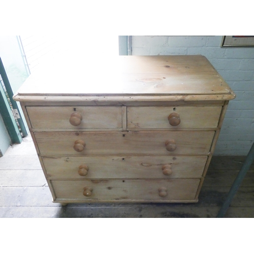 1 - A Victorian stripped pine chest of three long and two short drawers with bun handles. 3'3