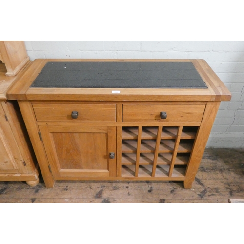 36 - A modern light oak kitchen sideboard with inset marble top, two drawers cupboards and wine rack unde... 