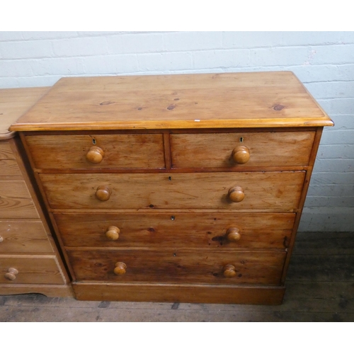 45 - A Victorian style stained pine chest of three long and two short drawers with bun handles. 40